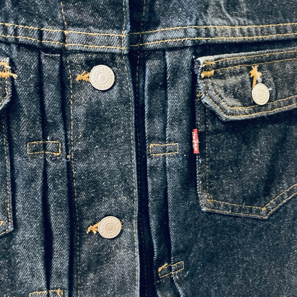 Genuine Levi’s Trucker Vest. Frayed edges, 100% cotton denim. Heavy Dark Blue.